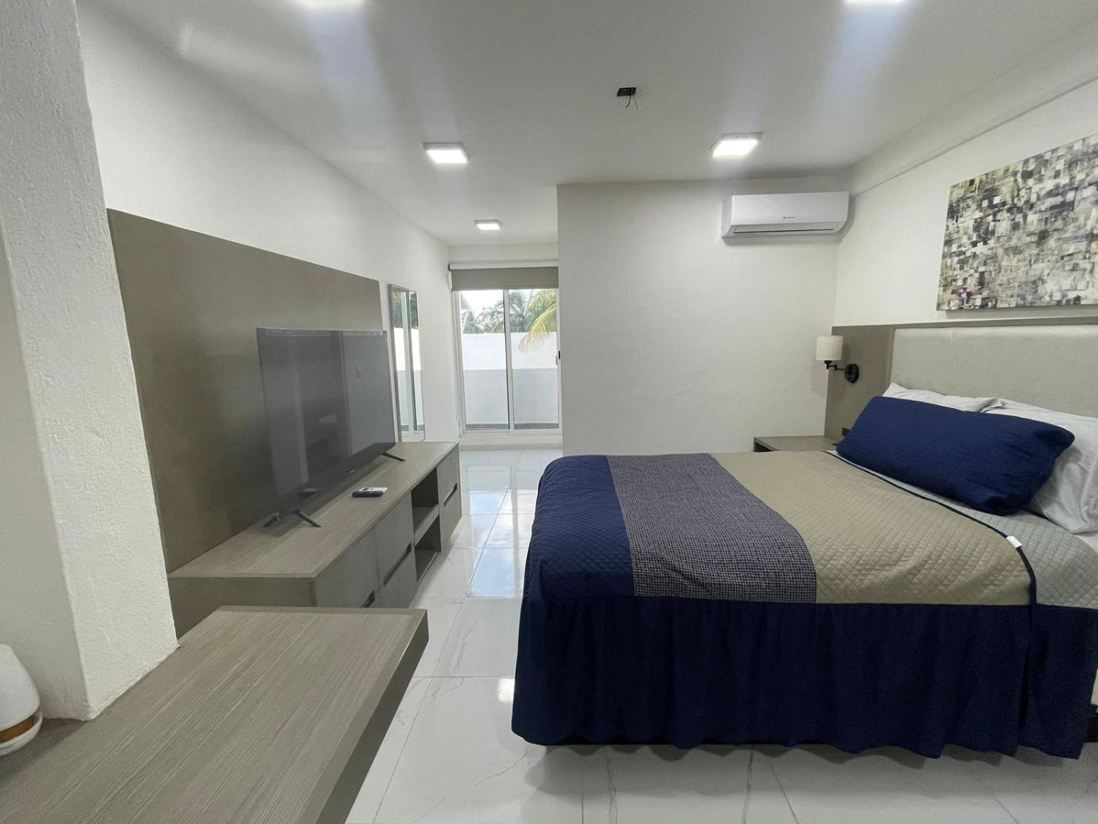 Guest House Stone Wall Residences แคนคูน ภายนอก รูปภาพ