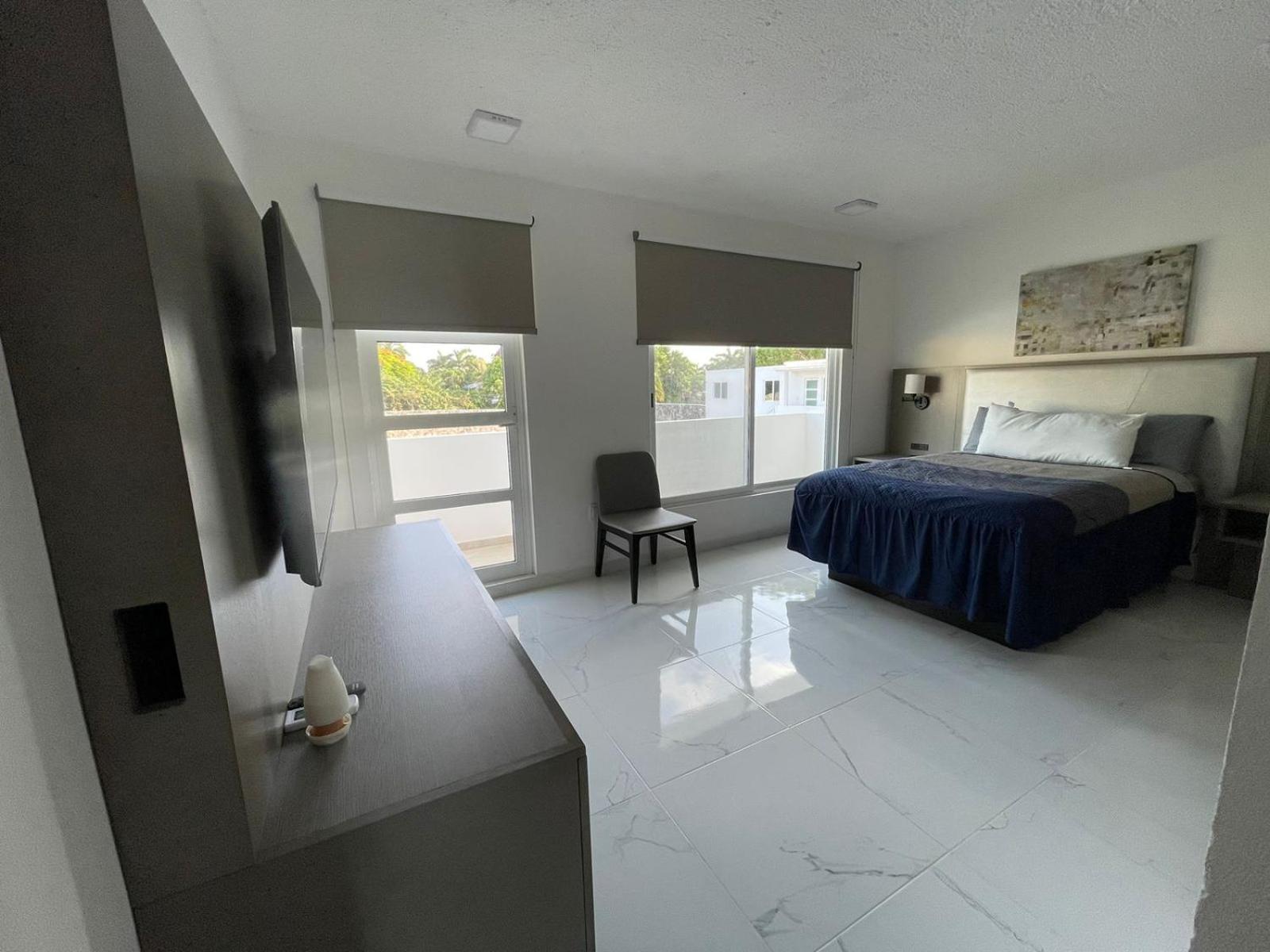 Guest House Stone Wall Residences แคนคูน ภายนอก รูปภาพ