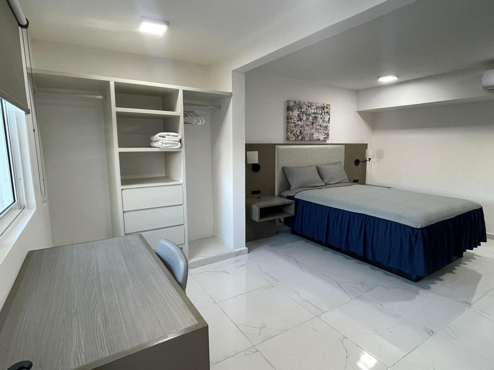 Guest House Stone Wall Residences แคนคูน ภายนอก รูปภาพ