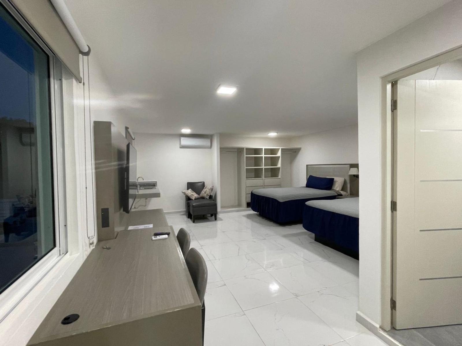 Guest House Stone Wall Residences แคนคูน ภายนอก รูปภาพ