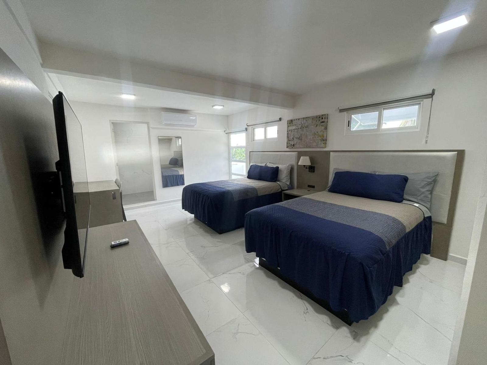 Guest House Stone Wall Residences แคนคูน ภายนอก รูปภาพ