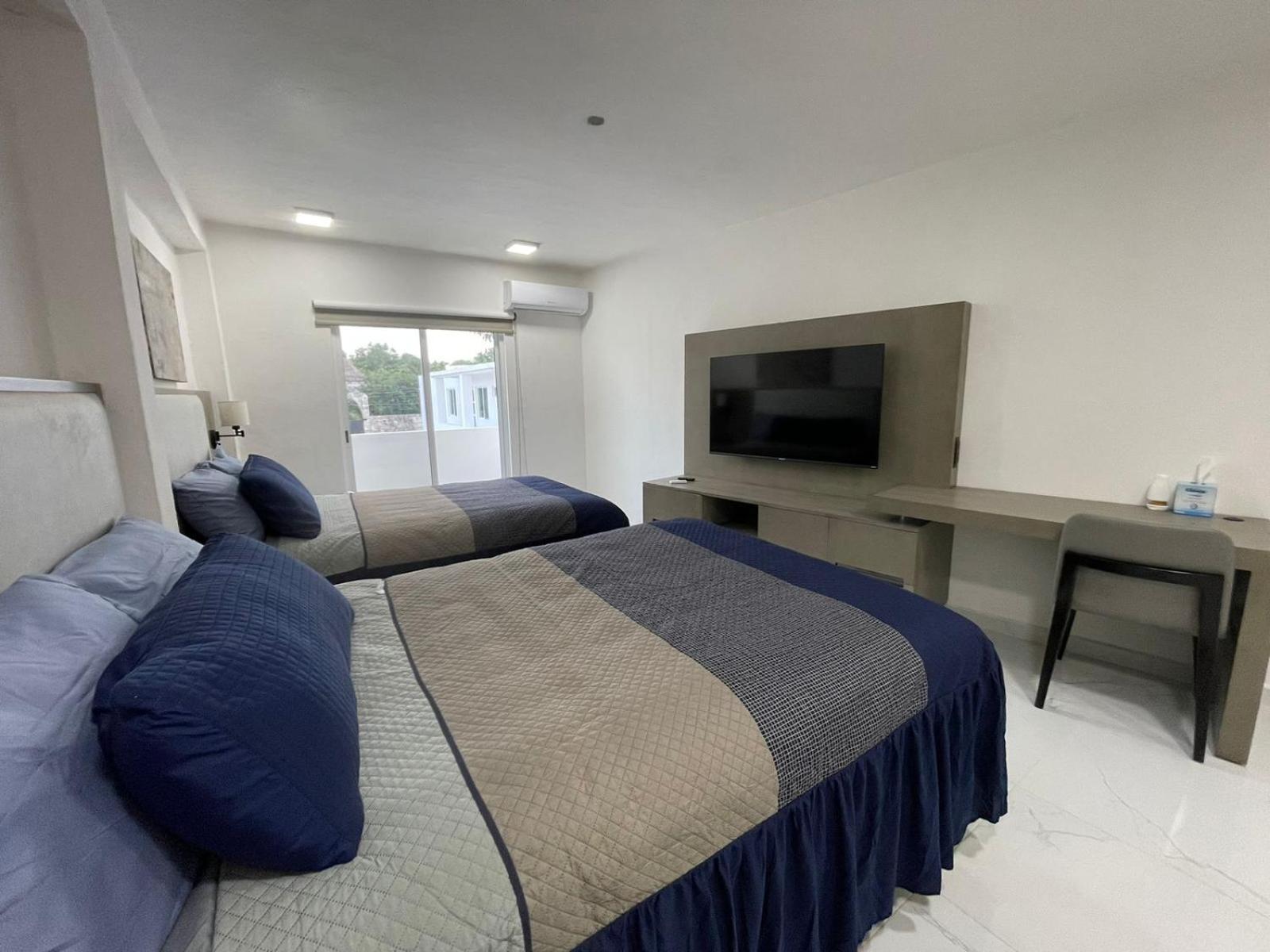 Guest House Stone Wall Residences แคนคูน ภายนอก รูปภาพ