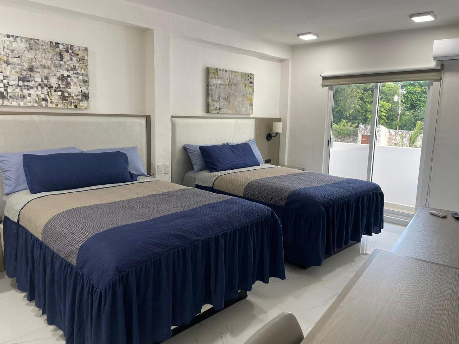 Guest House Stone Wall Residences แคนคูน ภายนอก รูปภาพ