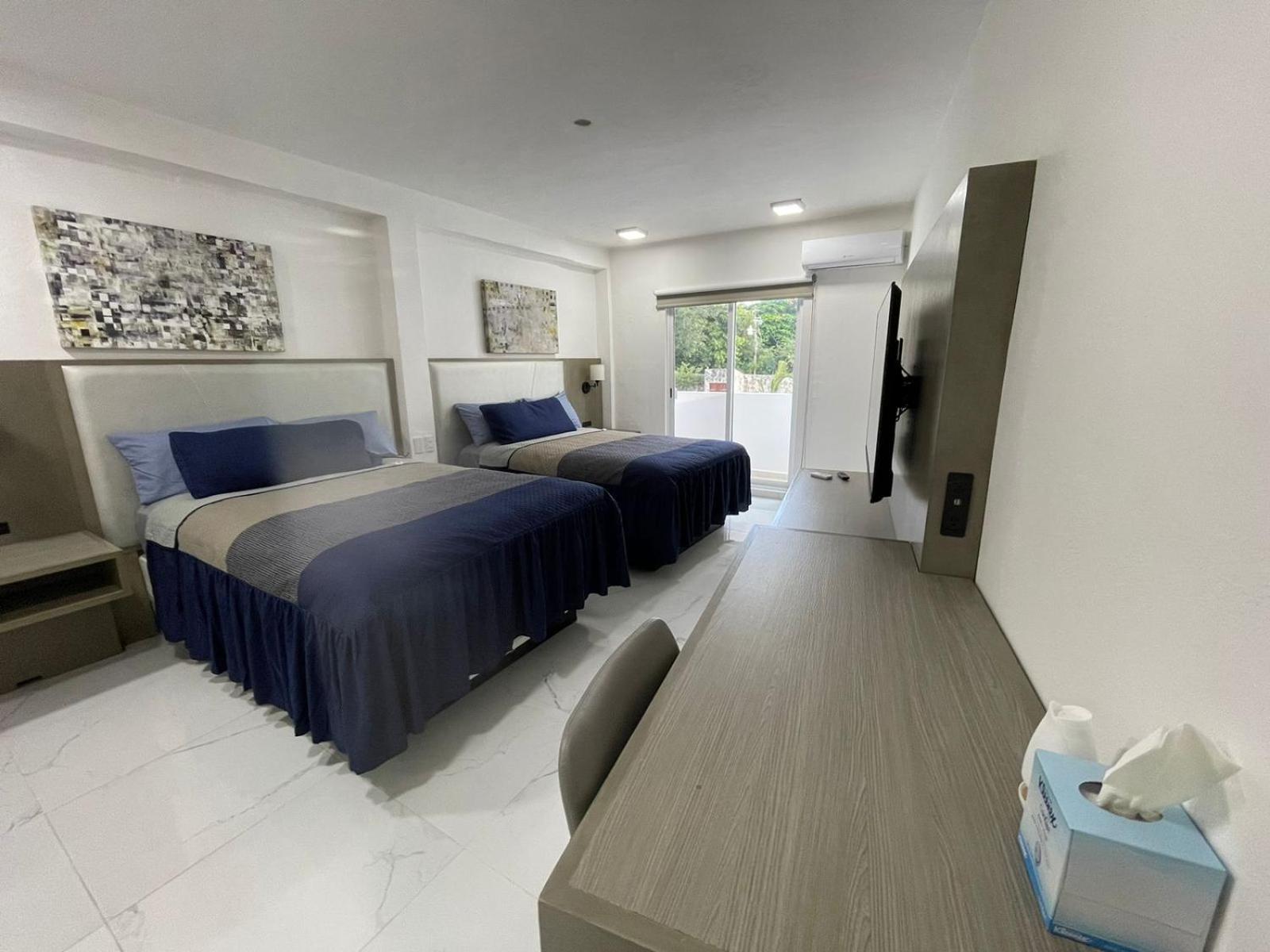 Guest House Stone Wall Residences แคนคูน ภายนอก รูปภาพ
