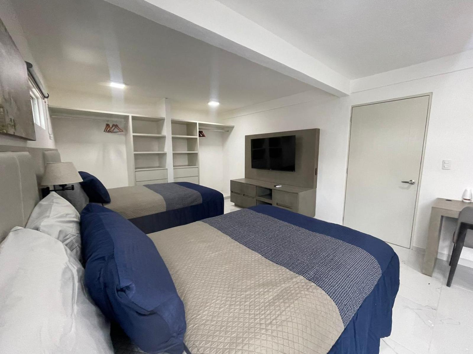 Guest House Stone Wall Residences แคนคูน ภายนอก รูปภาพ
