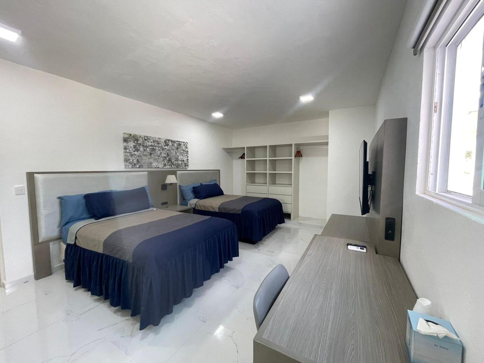 Guest House Stone Wall Residences แคนคูน ภายนอก รูปภาพ